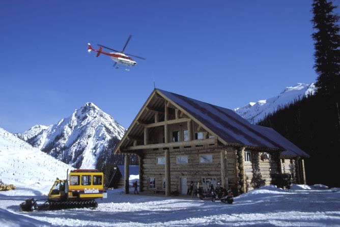 Chatter Creek lodge with snowcat and helicopter