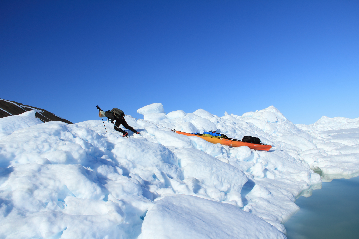 Erik Boomer pulling over a pressure ridge after we abandoned our skis.